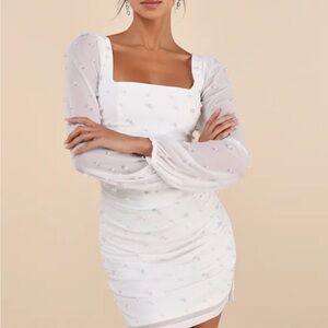 Elegant White Dress with Sheer Sleeves